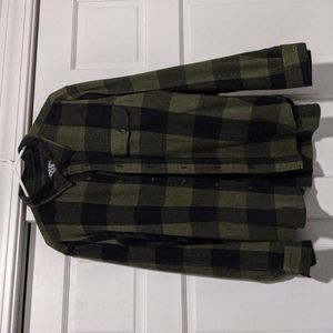 Rugged wearing men's flannel like button down shirt